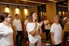 Happy participants in yoga classes