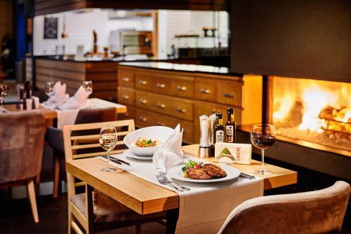 Beautiful fireplace in Le Bistro | Lucky Bansko