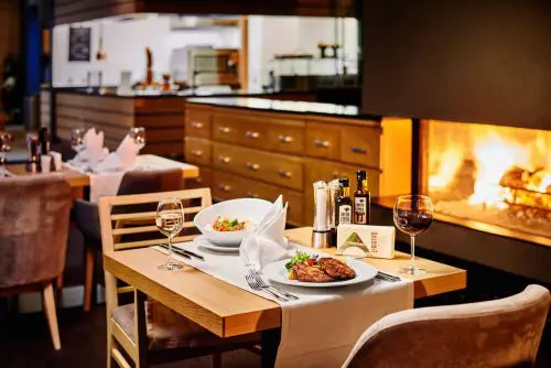 Beautiful fireplace in Le Bistro | Lucky Bansko